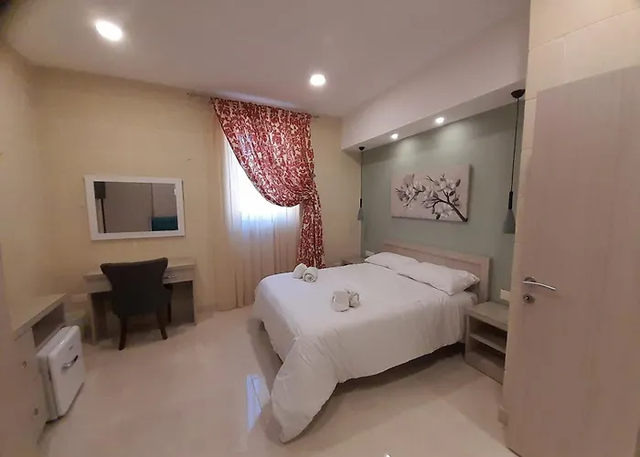 Gazde/Camere de închiriat Casa Maria Pia *